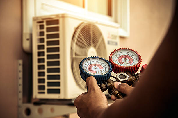 Professional Hvac technician working in Mayville, WI